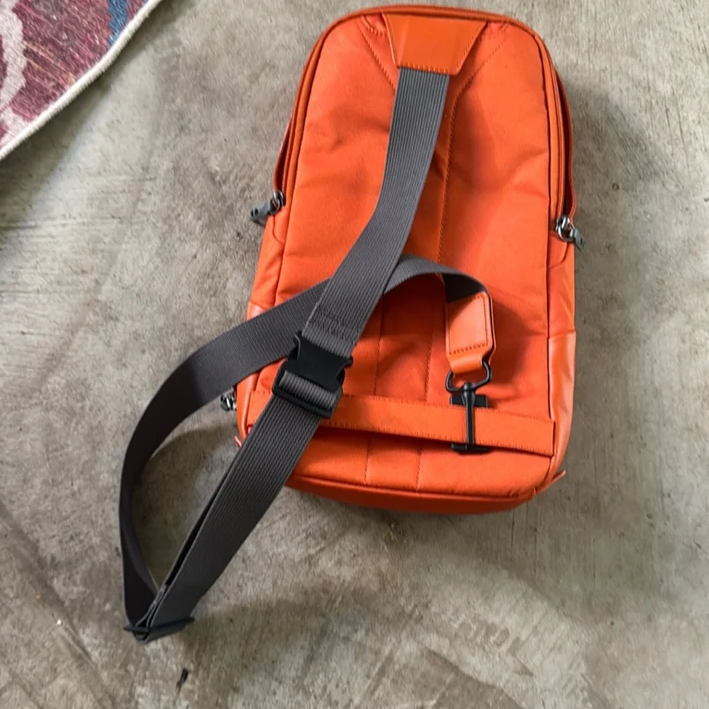 Time Tahoe Marshall sling bag in orange